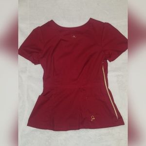 Jaanuu peplum scrub top